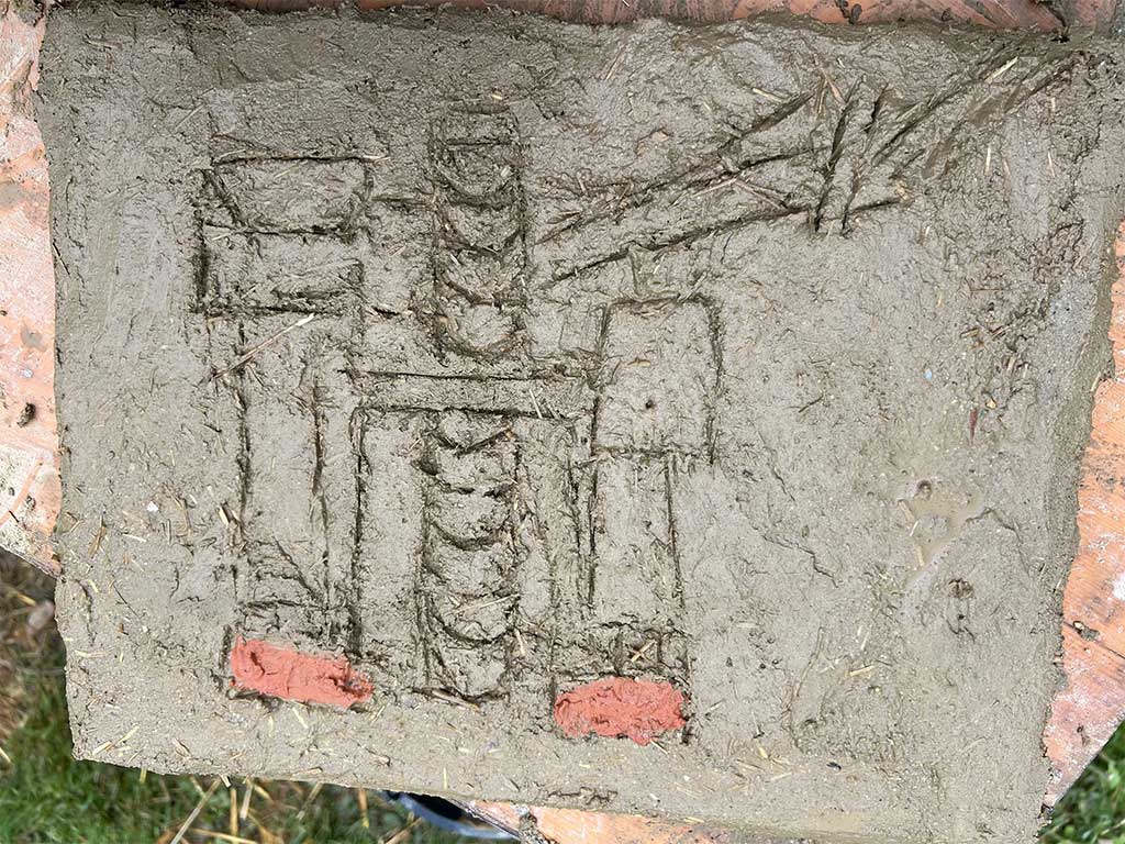 Ein Bild über den Lehmbaukurs bei Sand und Kies, Firma Rögner